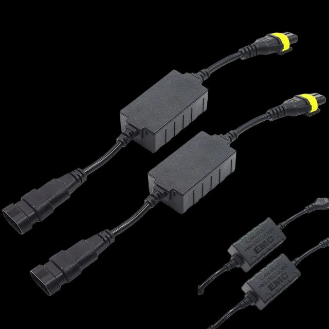 Two black automotive electrical relays with attached cables and connectors, shown on a plain white background. One relay has a yellow band near its connector, and the image also includes smaller duplicate views of the same product in the lower right.