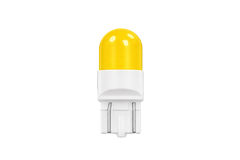 A single yellow LED light bulb with a white base, centered on a solid black background.
