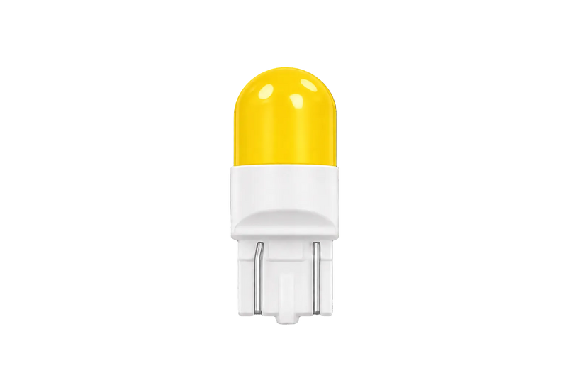 A single yellow LED light bulb with a white base, centered on a solid black background.