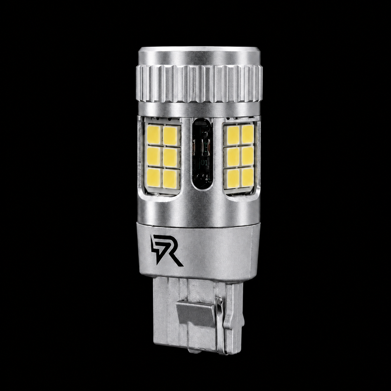 A silver LED car light bulb with yellow LED chips, featuring a ribbed top and a T10 base, shown against a solid black background.