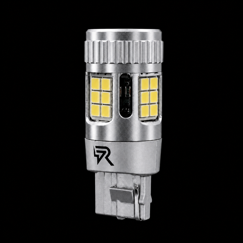 A silver LED car light bulb with yellow LED chips, featuring a ribbed top and a T10 base, shown against a solid black background.