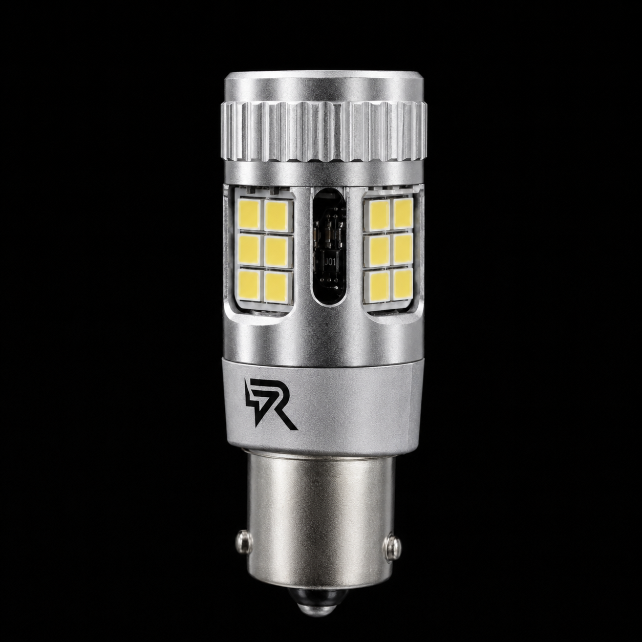 A silver metal LED car light bulb with yellow LED chips, shown vertically against a solid black background.