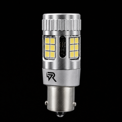 A silver metal LED car light bulb with yellow LED chips, shown vertically against a solid black background.
