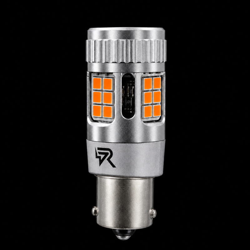 A silver metal LED car light bulb with orange LED chips visible on both sides, set against a solid black background.