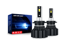 Two LED car light bulbs with packaging on a white background