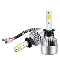 Two silver LED car headlight bulbs with ribbed heat sinks, yellow LED chips, and black connectors, shown on a plain white background.