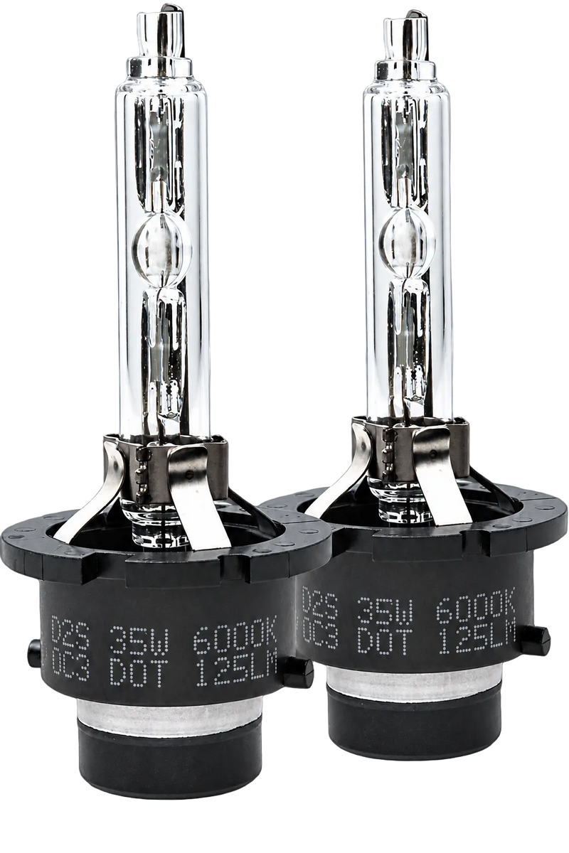 Two automotive headlight bulbs with clear glass envelopes and black base sockets, shown side by side on a dark gradient background. White text on the bases reads 'D2S 35W 6000K' and 'DOT 125LN'.