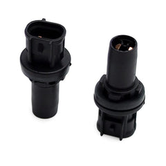 Two black plastic automotive electrical connector components shown on a plain white background.