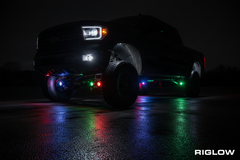 Riglow RGBW Addressable LED Rock Lights installed under vehicle with colorful underglow
