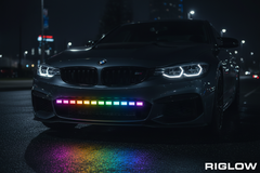 Riglow RGBW Chasing LED Light Bar mounted on front bumper at night