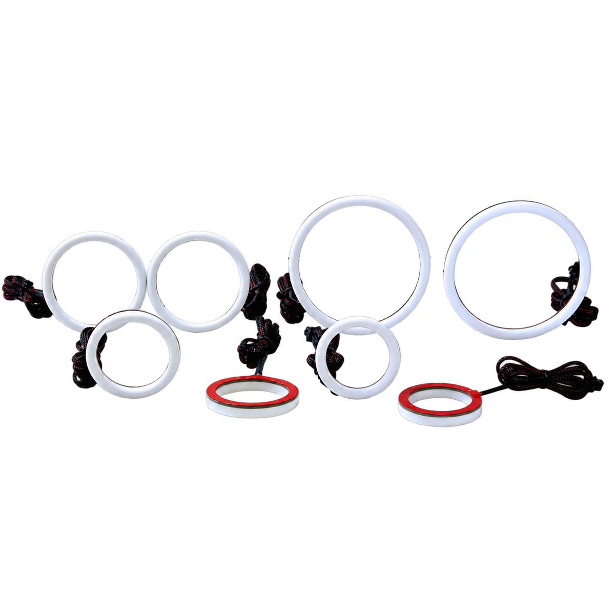 A set of white circular LED ring lights in various sizes, shown with black wiring and two red-rimmed rings on a plain white background.