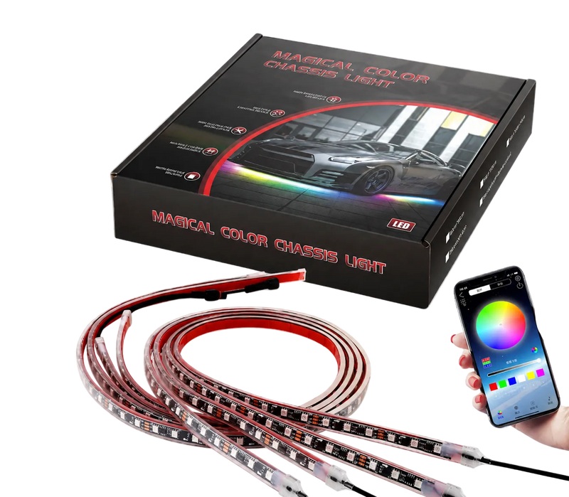 Magic Color Chase LED light strip shown with its black retail box, coiled flexible strip, and a hand holding a smartphone app controller on a transparent/checkered background.